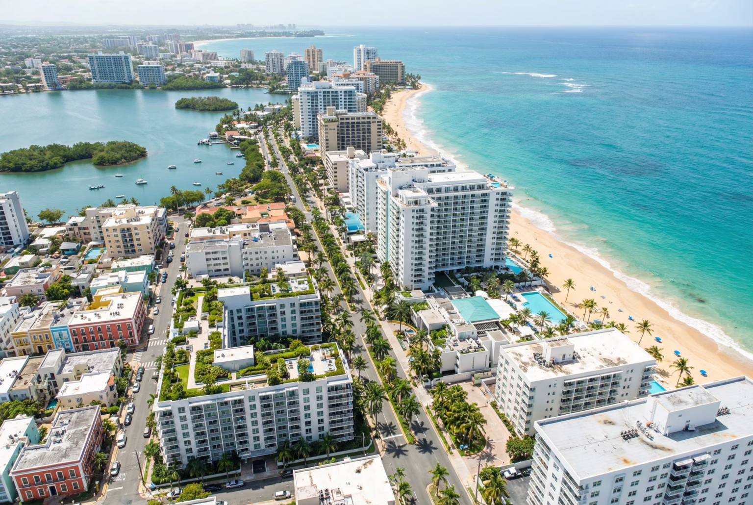 Aerial view of Condado, Puerto Rico, showing the vibrant city and coastline.